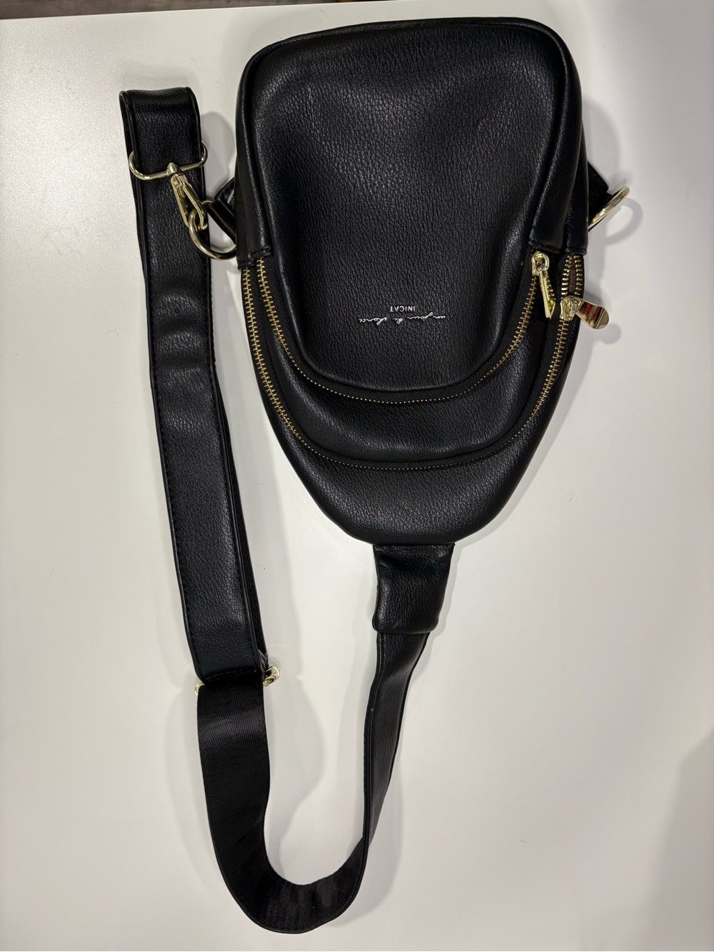 Black Leather Crossbody Bag with Gold Accents